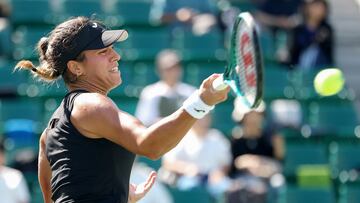 Spain's Jessica Bouzas Maneiro hits a return to Romania's Jaqueline Cristian during their women's singles match at the Japan Open tennis tournament in Osaka on October 15, 2025. (Photo by PAUL MILLER / AFP)