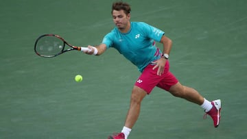 Stanislas Wawrinka devuelve una bola a Philipp Kohlschreiber durante el partido entre ambos tenistas en el BNP Paribas Open de Indian Wells.