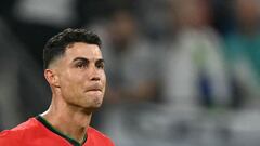 Portugal's forward #07 Cristiano Ronaldo reacts after failing to score a penalty kick during the UEFA Euro 2024 round of 16 football match between Portugal and Slovenia at the Frankfurt Arena in Frankfurt am Main on July 1, 2024. (Photo by PATRICIA DE MELO MOREIRA / AFP)