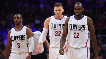 Apr 1, 2017; Los Angeles, CA, USA; Los Angeles Clippers guard Chris Paul (3), forward Blake Griffin (32) and forward Luc Mbah a Moute (12) walk to the bench for a time out in the second half of the game against the Los Angeles Lakers at Staples Center. Clippers won 115-104. Mandatory Credit: Jayne Kamin-Oncea-USA TODAY Sports