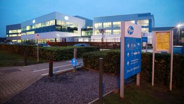 The Pfizer logo is seen at the entrance to Pfizer factory in Puurs, Belgium December 2, 2020. REUTERS/Bart Biesemans