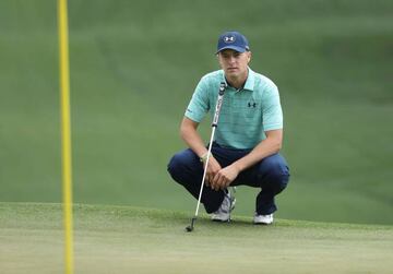 Jordan Spieth of the United States lines up a putt on the seventh green during a practice round prior to the start of the 2017 Masters Tournament