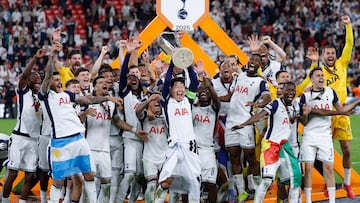 Tottenham Hotspur's South Korean forward #07 Son Heung-min raises the trophy as he celebrates with teammates winning the UEFA Europa League final football match between Tottenham Hotspur and Manchester United at San Mames stadium in Bilbao on May 21, 2025. (Photo by Thomas COEX / AFP)