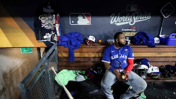 LOS ANGELES, CALIFORNIA - OCTOBER 27: Vladimir Guerrero Jr. #27 of the Toronto Blue Jays looks on from the dugout during the 15th inning against the Los Angeles Dodgers in game three of the 2025 World Series at Dodger Stadium on October 27, 2025 in Los Angeles, California.   Patrick Smith/Getty Images/AFP (Photo by Patrick Smith / GETTY IMAGES NORTH AMERICA / Getty Images via AFP)