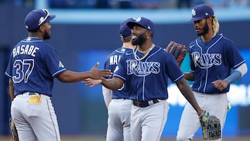 TORONTO, CANADA - SEPTEMBER 30: Osleivis Basabe #37 and Randy Arozarena #56 of the Tampa Bay Rays celebrate their MLB game victory over the Toronto Blue Jays at Rogers Centre on September 30, 2023 in Toronto, Canada.   Cole Burston/Getty Images/AFP (Photo by Cole Burston / GETTY IMAGES NORTH AMERICA / Getty Images via AFP)