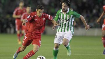 Navas (left) made 391 appearances for Sevilla before joining City in 2013.