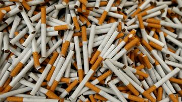 FILE PHOTO: Lucky Strike cigarettes are seen during the manufacturing process in the British American Tobacco Cigarette Factory (BAT) in Bayreuth, Germany, April 30, 2014. REUTERS/Michaela Rehle/File Photo