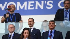 (Centre-row L to R) Olympique Lyonnais' President Jean-Michel Aulas, UEFA President Aleksander Ceferin, and FC Barcelona President Joan Laporta attend the UEFA Women’s Champions League Final football match between Spain's Barcelona and France's Lyon at the Allianz Stadium in the Italian city of Turin on May 21, 2022. (Photo by FRANCK FIFE / AFP)