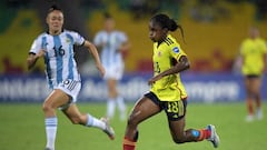 vColombia's Linda Caicedo (R) and Argentina's Marina Delgado vie for the ball during their Conmebol 2022 women's Copa America football tournament semifinal match at the Alfonso Lopez stadium in Bucaramanga, Colombia, on July 25, 2022. (Photo by Raul ARBOLEDA / AFP) (Photo by RAUL ARBOLEDA/AFP via Getty Images)