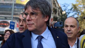 Catalan separatist leader Carles Puigdemont makes his way as he returns to Spain from seven years of self-imposed exile despite a pending warrant for his arrest, during a welcoming event organised by his party, Junts per Catalunya, in Barcelona, Spain, August 8, 2024. REUTERS/Nacho Doce