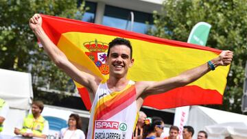 Spain&#039;s Diego Garcia Carrera celebrates after taking the second place in the men&#039;s 20km walk final race during the European Athletics Championships in Berlin on August 11, 2018. (Photo by Andrej ISAKOVIC / AFP)