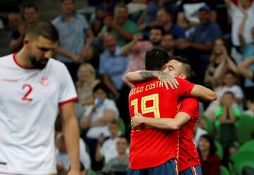 Diego Costa and Iago Aspas celebrate Spain's winner over Tunisia.