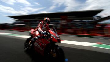 Italy's Andrea Dovizioso rides his Ducati through the stands during the second free practice session for the Italian Moto GP Grand Prix at the Mugello race track on May 31, 2019 in Scarperia e San Piero. (Photo by Filippo MONTEFORTE / AFP)