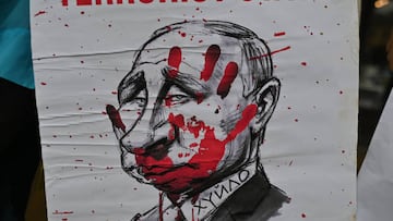 A protester holds a placard with a caricature of Vladimir Putin and words 'Terrorist State'.
Ukrainians people living in Krakow and their supporters are seen during the '200 days of Terror' protest in Krakow's Main Square, on the 200th day of the Russian invasion of Ukraine.
On Sunday, September 11, 2022, in Krakow, Lesser Poland Voivodeship, Poland. (Photo by Artur Widak/NurPhoto via Getty Images)