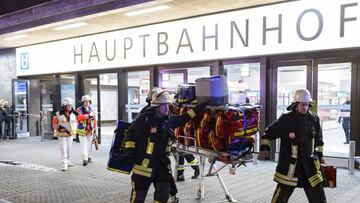 DUSSELDORF, GERMANY - MARCH 09: Police and emergency workers stand outside the main railway station following what police described as an axe attack on March 9, 2017 in Dusseldorf, Germany. According to initial reports a man wielding an axe entered the station and injured two people. (Photo by Alexander Scheuber/Getty Images)