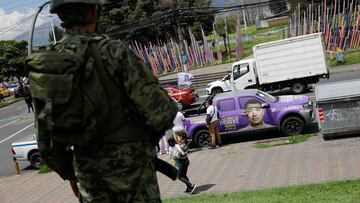 A member of military personnel secures the area around the campaign rally, in Quito, Ecuador October 11, 2023. REUTERS/Karen Toro