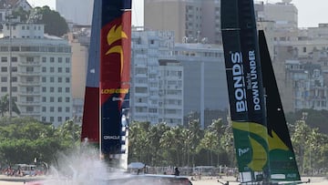 Teams from Spain (L) and Australia compete during race day two of the Rio 2026 SailGP in Guanabara Bay, Rio de Janeiro, Brazil, on April 12, 2026. (Photo by Pablo PORCIUNCULA / AFP)