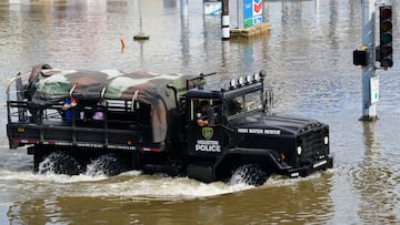 Hurricane Beryl battered southeast Texas early Monday with heavy rain and strong winds, killing two people and causing power outages for millions.