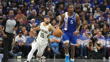 Dec 4, 2023; Sacramento, California, USA; New Orleans Pelicans guard Jose Alvarado (15) steals the ball from Sacramento Kings guard De'Aaron Fox (5) during the first quarter at Golden 1 Center. Mandatory Credit: Darren Yamashita-USA TODAY Sports