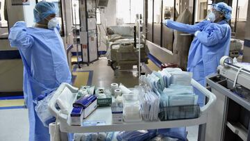 BOGOTA, COLOMBIA - AUGUST 28: Health workers get ready with their personal protective equipment (PPE) to treat a patient with Covid-19 in the Intensive Care Unit at de La Samaritana University Hospital on August 28, 2020 in Bogota, Colombia. According to 