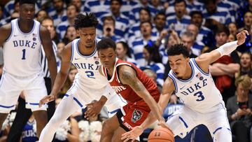 Feb 16, 2019; Durham, NC, USA; Duke Blue Devils guard Tre Jones (3) knocks the ball away fro North Carolina State Wolfpack guard Markell Johnson (11) during the second half at Cameron Indoor Stadium. The Blue Devils won 94-78. Mandatory Credit: Rob Kinnan-USA TODAY Sports