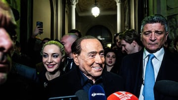 MILAN, ITALY - FEBRUARY 12: Silvio Berlusconi (C), Leader of Forza Italia Party, answers questions of press members after casting his vote during the Lombardy regional elections in Milan, Italy on February 12, 2023. (Photo by Piero Cruciatti/Anadolu Agency via Getty Images)