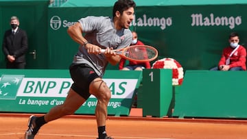 Chile&#039;s Christian Garin rund for the ball during his third round singles match against Greece&#039;s Stefanos Tsitsipas on day six of the Monte-Carlo ATP Masters Series tournament in Monaco on April 15, 2021. (Photo by Valery HACHE / AFP)