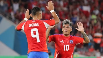 Futbol, Chile vs Panama
Partido amistoso 2025
El jugador de la seleccion chilena Nicolas Guerra, izquierda, celebra su gol contra Panama durante el partido amistoso disputado en el estadio Nacional de Santiago, Chile.
8/02/2025
Felipe Zanca/Photosport
Football, Chile vs Panama
2025 friendly match
Chile's player Nicolas Guerra, left, celebrates his goal against Panama during a friendly match at the Nacional stadium in Santiago, Chile.
8/02/2025
Felipe Zanca/Photosport