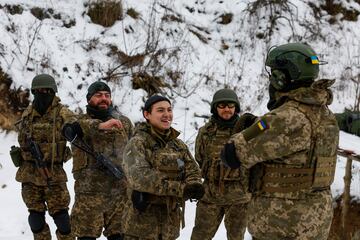 Members of the Siberian Battalion of the Ukraine's Armed Forces International Legion attend military exercises, amid Russia's attack on Ukraine, at an undisclosed location in Kyiv region, Ukraine December 13, 2023. REUTERS/Valentyn Ogirenko