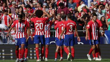 Atletico Madrid's Brazilian forward #12 Samuel Lino celebrates with teammates scoring his team's first goal during the Spanish league football match between Club Atletico de Madrid and Real Sociedad at the Wanda Metropolitano stadium in Madrid on October 8, 2023. (Photo by Pierre-Philippe MARCOU / AFP)