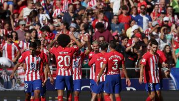 Atletico Madrid's Brazilian forward #12 Samuel Lino celebrates with teammates scoring his team's first goal during the Spanish league football match between Club Atletico de Madrid and Real Sociedad at the Wanda Metropolitano stadium in Madrid on October 8, 2023. (Photo by Pierre-Philippe MARCOU / AFP)