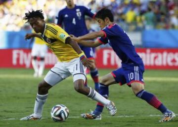 Juan Cuadrado y Shinji Kagawa.
