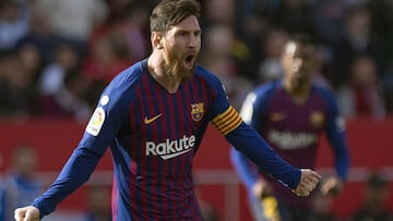 Barcelona&#039;s Argentinian forward Lionel Messi celebrates after scoring a goal during the Spanish league football match between Sevilla FC and FC Barcelona at the Ramon Sanchez Pizjuan stadium in Seville on February 23, 2019. (Photo by JORGE GUERRERO /