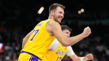 PHOENIX, ARIZONA - OCTOBER 14: Luka Doncic #77 of the Los Angeles Lakers reacts during the first half of the NBA preseason game against the Phoenix Suns at Mortgage Matchup Center on October 14, 2025 in Phoenix, Arizona. NOTE TO USER: User expressly acknowledges and agrees that, by downloading and or using this photograph, User is consenting to the terms and conditions of the Getty Images License Agreement. Kelsey Grant/Getty Images/AFP (Photo by Kelsey Grant / GETTY IMAGES NORTH AMERICA / Getty Images via AFP)