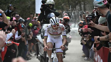 Team UAE's slovenain rider Tadej Pogacar rides as he leads the race during the 19th one-day classic Strade Bianche (White Roads) men's cycling race between Siena and Siena in Tuscany on March 8, 2025. (Photo by Marco BERTORELLO / AFP)