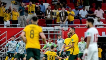 Australia's midfielder Ajdin Hrustic (C) celebrates after scoring his team's second goal during the FIFA World Cup 2022 play-off qualifier football match between UAE and Australia at Ahmad bin Ali stadium in Qatar's Ar-Rayyan on June 7, 2022. (Photo by Mustafa ABUMUNES / AFP) (Photo by MUSTAFA ABUMUNES/AFP via Getty Images)