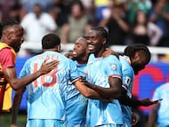 DR Congo players celebrate after winning the match and qualifying for the World Cup during the 2026 FIFA World Cup qualifiers final playoff football match between the Democratic Republic of the Congo and Jamaica at the Akron Stadium in Zapopan, Jalisco state, Mexico, on March 31, 2026. (Photo by Ulises Ruiz / AFP)