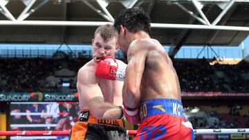 BRISBANE, QLD - JULY 02:  Manny Pacquiao lands a punch on Jeff Horn during the WBO Welterweight Title Fight between Jeff Horn of Australia and Manny Pacquiao of the Philippines at Suncorp Stadium on July 2, 2017 in Brisbane, Australia.  (Photo by Bradley Kanaris/Getty Images)