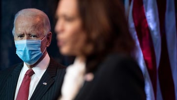 President-elect Joe Biden looks on as Vice president-elect Kamala Harris delivers remarks following a meeting with the Governors and Covid team on November 19, 2020 in Wilmington, Delaware. 