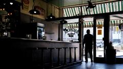 A person walks through the door at The Rough House restaurant ahead of South Carolina?s Republican presidential primary election in Abbeville, South Carolina, U.S., February 21, 2024. REUTERS/Allison Joyce