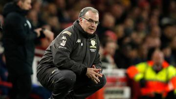 (FILES) In this file photo taken on January 6, 2020 Leeds United&#039;s Argentinian head coach Marcelo Bielsa watches from the touchline duirng the English FA Cup third round football match between Arsenal and Leeds United at The Emirates Stadium in London. - For a man nicknamed &#039;El Loco&#039; (mad man) and with little silverware in his long managerial career, Marcelo Bielsa is an unlikely hero to a younger generation of coaches. However, hordes of Leeds fans will now treat him with similar reverence after he guided one of English football&#039;s sleeping giants back to the Premier League after a 16-year wait. (Photo by Adrian DENNIS / AFP)