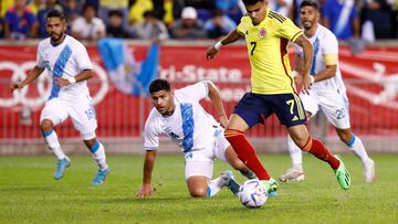 Colombia�s Luis Diaz (2R) shoots in between players during the international friendly football match between Colombia and Guatemala at Red Bull Arena in Harrison, New Jersey, on September 24, 2022. (Photo by Andres Kudacki / AFP)