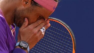 (FILES) In this file photo taken on April 25, 2021 Spain's Rafael Nadal reacts during his ATP Barcelona Open tennis tournament singles final match against Greece's Stefanos Tsitsipas at the Real Club de Tenis in Barcelona. - Rafael Nadal announced on Augu