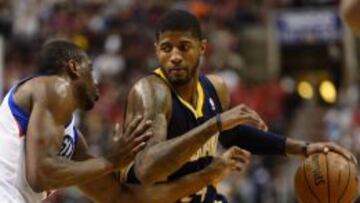 Paul George y Thaddeus Young.