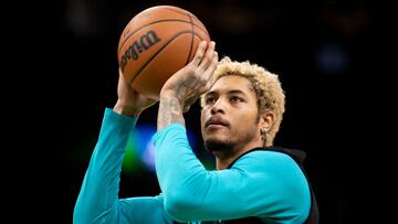 (FILES) In this file photo taken on February 2, 2022, Kelly Oubre Jr., #12 of the Charlotte Hornets, shoots the ball during warmups before a game against the Boston Celtics at TD Garden in Boston, Massachusetts. - Oubre Jr. was fined $15,000 by the NBA on February 9, 2022, for violating league rules prohibiting profane language being directed toward the spectator stands. (Photo by Maddie Malhotra / GETTY IMAGES NORTH AMERICA / AFP)