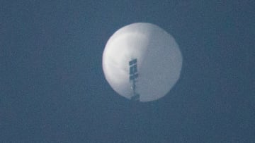 A balloon flies in the sky over Billings, Montana, U.S. February 1, 2023 in this picture obtained from social media. Chase Doak/via REUTERS THIS IMAGE HAS BEEN SUPPLIED BY A THIRD PARTY. MANDATORY CREDIT.
