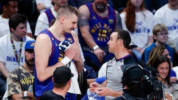 Apr 16, 2023; Denver, Colorado, USA; Denver Nuggets center Nikola Jokic (15) talks with referee Josh Tiven (58) after a play in the fourth quarter against the Minnesota Timberwolves during game one of the 2023 NBA Playoffs at Ball Arena. Mandatory Credit: Isaiah J. Downing-USA TODAY Sports