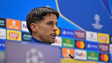 Barcelona's Portuguese defender #02 Joao Cancelo gives a press conference on the eve of their UEFA Champions League quarter final football match against Club Atletico de Madrid at the Joan Gamper training ground in Sant Joan Despi, near Barcelona, on April 7, 2026. (Photo by MANAURE QUINTERO / AFP)