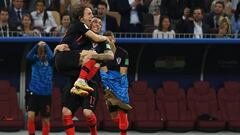 Croatia&#039;s midfielder Luka Modric and Croatia&#039;s forward Mario Mandzukic celebrate their win at the end of the Russia 2018 World Cup semi-final football match between Croatia and England at the Luzhniki Stadium in Moscow on July 11, 2018.
 Croatia