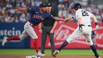Jul 5, 2024; Bronx, New York, USA; Boston Red Sox center fielder Ceddanne Rafaela (43) attempts to tag New York Yankees third baseman DJ LeMahieu (26) at second base during the third inning at Yankee Stadium. Mandatory Credit: Vincent Carchietta-USA TODAY Sports